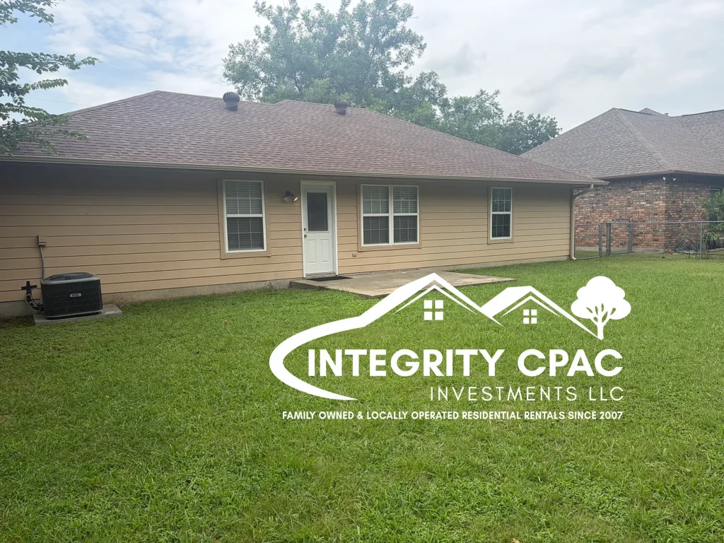 Green back yard and exterior of 214 Fair, Integrity CPAC LLC