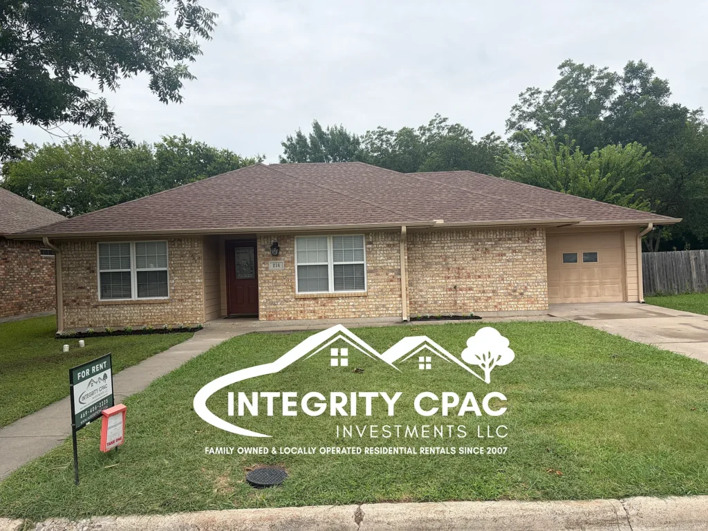 Exterior of brick family home for rent in Gainesville, TX: 214 Fair, Integrity CPAC LLC