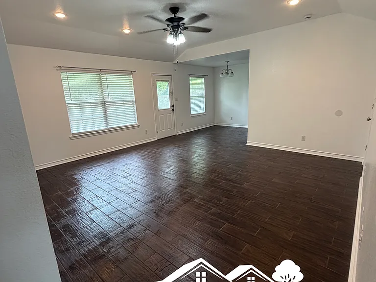 Living room, bright with dark flooring at 214 Fair, Integrity CPAC LLC