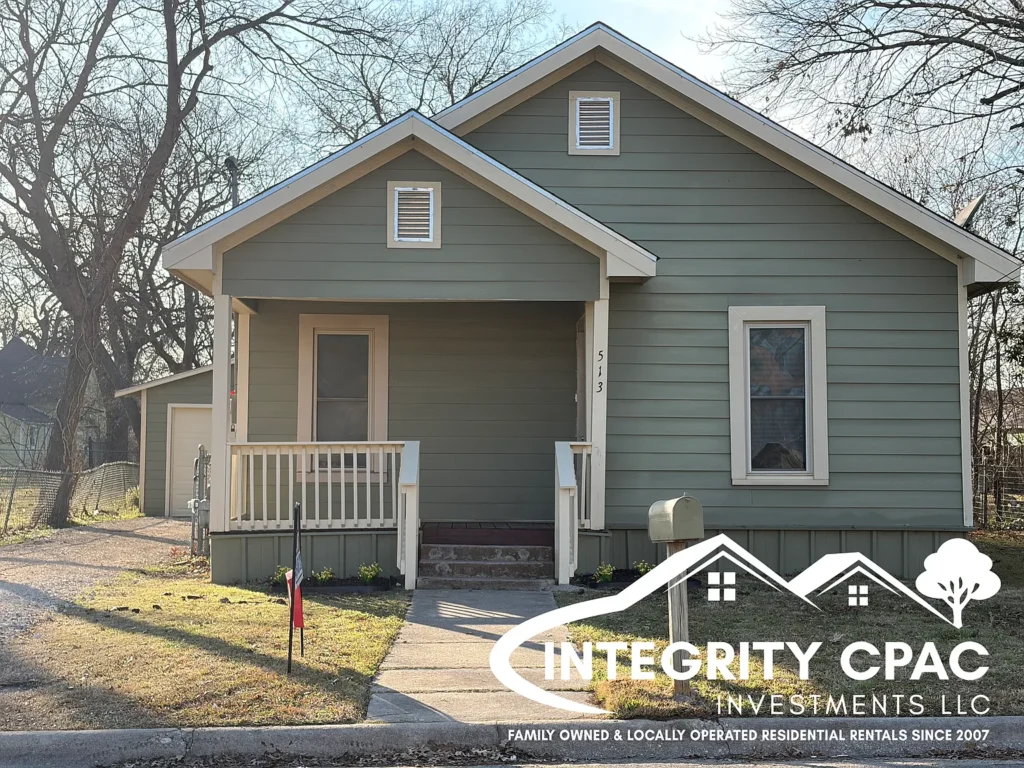 513 Ritchey front of green house - rental home Gainesville Texas