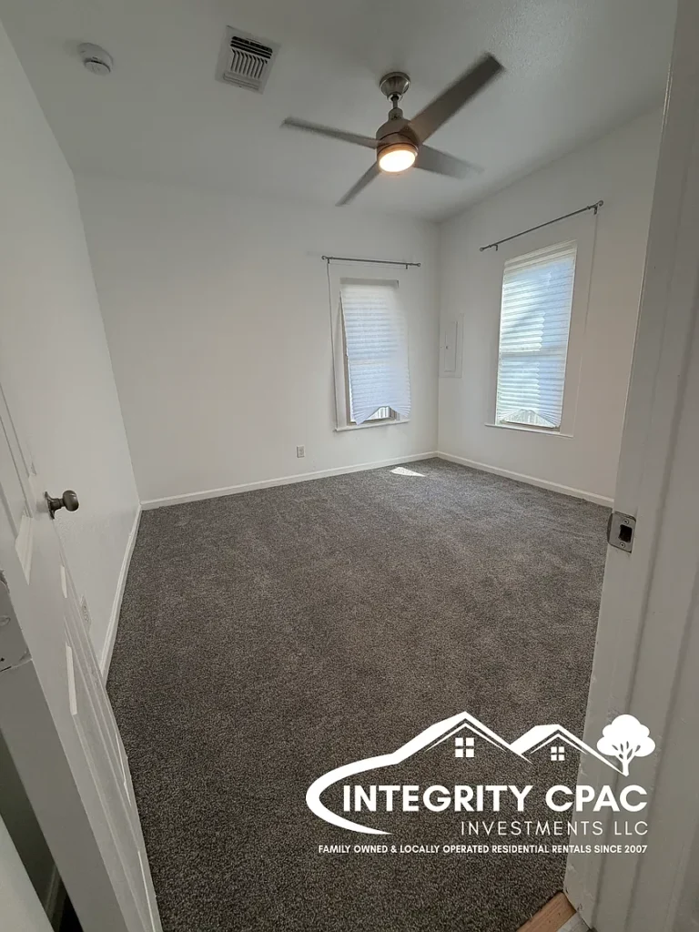 New carpet in bedroom, residential rental near I-35